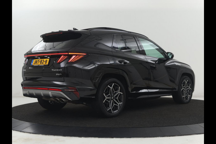 Hyundai Tucson 1.6 T-GDI PHEV N Line Sky 4WD | Pano | SOH 97,3% Stoelverwarming | Leder/Alcantara | Camera | Adaptive cruise | Carplay | Full LED | Stuurverwarming | Keyless | Plug In