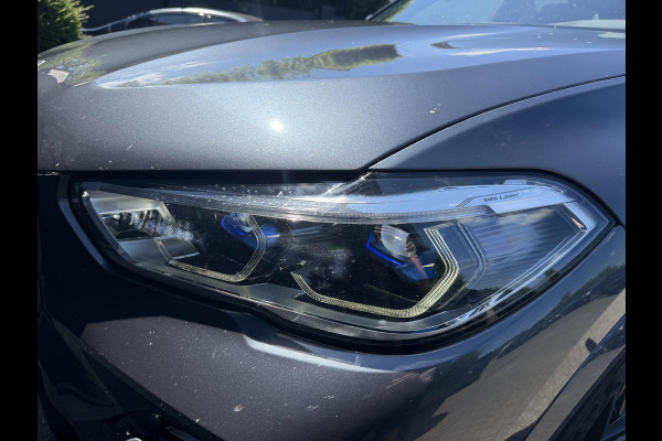 BMW X5 M50i High Executive | M-Sport | Panoramadak | 360* Camera | Skylounge | Laser | Elektrische Trekhaak |
