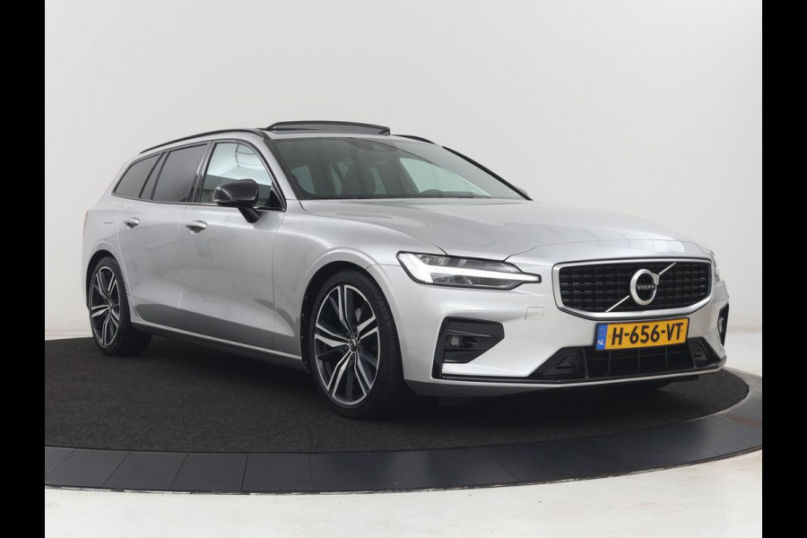 Volvo V60 2.0 T4 R-Design Panoramadak | Full LED | Trekhaak | Carplay | Pilot assist | Navigate | Stoel & Stuurverwarming | Achteruitrij camera | Cruise control | Climate control