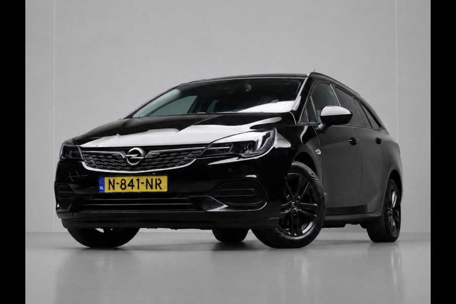 Opel Astra Sports Tourer 1.2 Design & Tech Sport (APPLE CARPLAY,NAVI,CAMERA,PDC,CLIMATE,CRUISE,GETINT,SPORTSTOELEN,LM VELGEN)