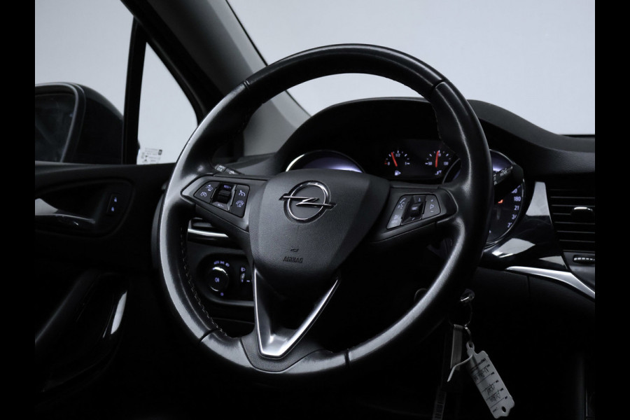Opel Astra Sports Tourer 1.2 Design & Tech Sport (APPLE CARPLAY,NAVI,CAMERA,PDC,CLIMATE,CRUISE,GETINT,SPORTSTOELEN,LM VELGEN)
