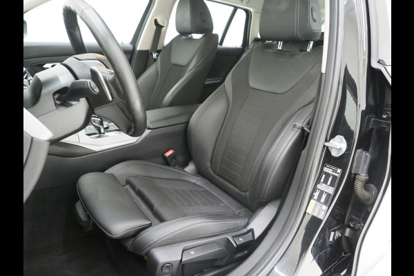BMW 3 Serie Touring 320e Shadow Line | Camera | Trekhaak | Leder/Stof | DAB | LED | Cruise | Carplay