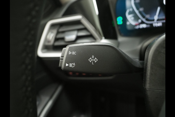 BMW 3 Serie Touring 320e Shadow Line | Camera | Trekhaak | Leder/Stof | DAB | LED | Cruise | Carplay