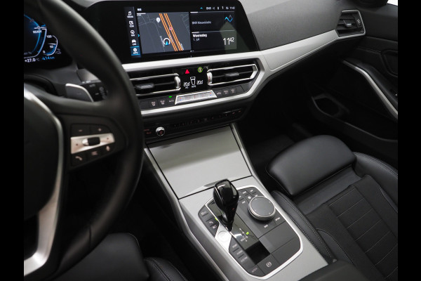 BMW 3 Serie Touring 320e Shadow Line | Camera | Trekhaak | Leder/Stof | DAB | LED | Cruise | Carplay