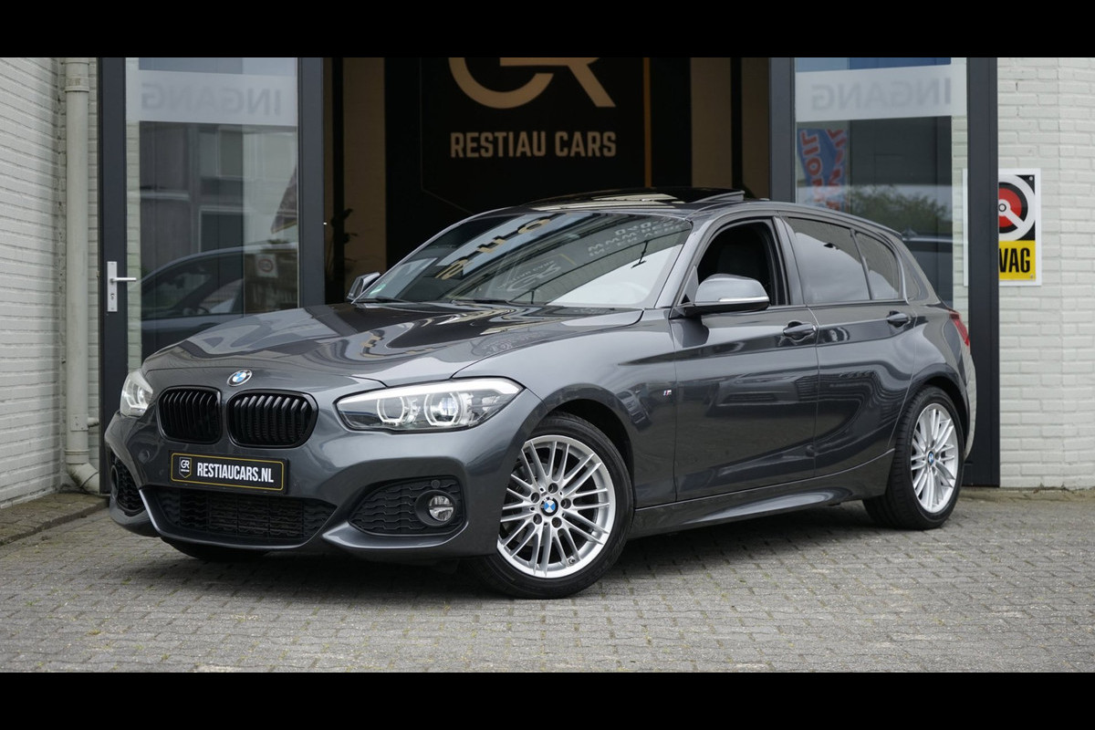 BMW 1-serie 118i M Sport Shadow Line AUTOMAAT|CRUISE|FULL LED|LEDER|NAVIGATIE|PANORAMA|STOELVERWARMING|TREKHAAK