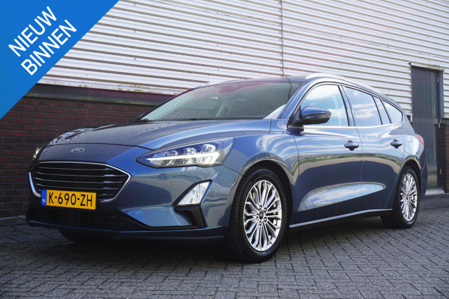 Ford FOCUS Wagon 1.0 EcoB.125PK Titanium Bus./Trekhaak/17Inch/B&O/ Winterpakket/Dealeronderhouden.
