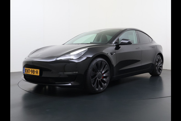 Tesla Model 3 Performance AWD 513PK Facelift Warmtepomp Lmv 20" Panoramadak Adap.Cruise Elek.Verwarmde Stoelen+Memory Inductieladen Navi Camer SOH 85.6% Led Pdc Privacy Glas Elek.Achterklep Keyless 4WD Fabrieksgarantie op Accu en Motor tot 18-02-2029/192.000KM