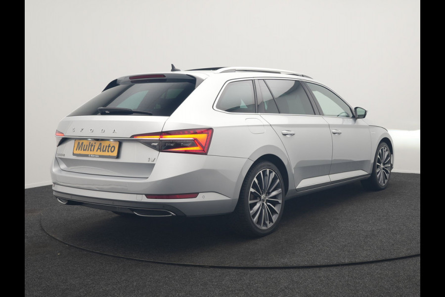 Škoda Superb Combi 1.4 TSI iV Laurin & Klement PHEV 218pk Dealer O.H. | Trekhaak Af Fabriek | Panodak | Adaptive Cruise | Camera | Lederen Comfortstoelen Memory & Ventilatie | Sfeerverlichting | Stoelen & Stuur Verwarmd | Keyless | Blis | Crystal LED | Plug In Hybrid |