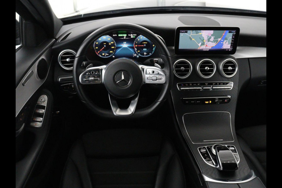 Mercedes-Benz C-Klasse 300e Business Solution AMG Limited | SOH 82,2% | 360 Camera | Stoelverwarming | Leder/Alcantara | Carplay | Matrix LED | Navigatie | Cruise control | Park Assist | Sfeerverlichting | PHEV | Plug In