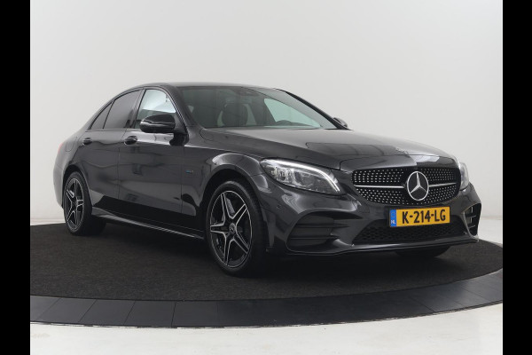Mercedes-Benz C-Klasse 300e Business Solution AMG Limited | SOH 82,2% | 360 Camera | Stoelverwarming | Leder/Alcantara | Carplay | Matrix LED | Navigatie | Cruise control | Park Assist | Sfeerverlichting | PHEV | Plug In