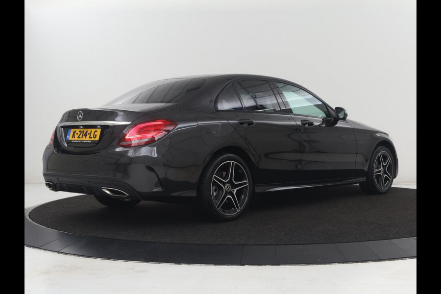 Mercedes-Benz C-Klasse 300e Business Solution AMG Limited | SOH 82,2% | 360 Camera | Stoelverwarming | Leder/Alcantara | Carplay | Matrix LED | Navigatie | Cruise control | Park Assist | Sfeerverlichting | PHEV | Plug In