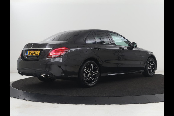Mercedes-Benz C-Klasse 300e Business Solution AMG Limited | SOH 82,2% | 360 Camera | Stoelverwarming | Leder/Alcantara | Carplay | Matrix LED | Navigatie | Cruise control | Park Assist | Sfeerverlichting | PHEV | Plug In