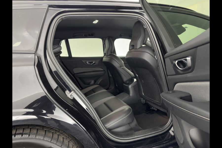 Volvo V60 2.0 T8 Recharge AWD R-Design Black-Line {SoH-99%} (Plug-in) (INCL-BTW) Aut. *LEATHER-FABRIC | FULL-LED | MEMORY-PACK | HARMAN/KARDON | DIGI-COCKPIT | HEATED-SPORTSEATS | KEYLESS | DAB+ | NAVI-FULLMAP | PDC | CRUISE | HEAD-UP | TOWBAR | 19''