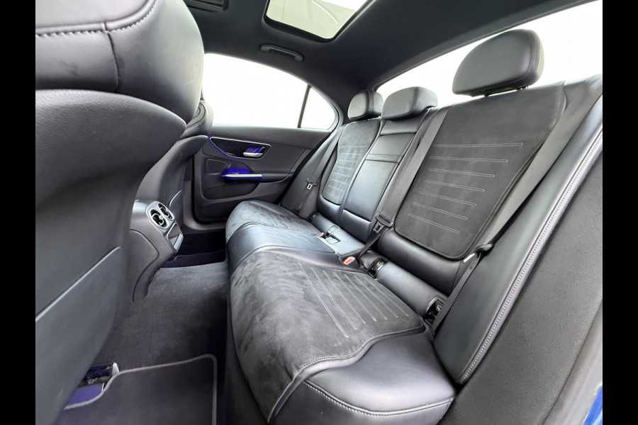 Mercedes-Benz C-Klasse 300 e AMG Line Limited PHEV | PANORAMADAK | DISTRONIC (ACC) | ACHTERUITRIJCAMERA | DODEHOEKASSISTENT | AMBIENT LIGHTING | MERCEDES-DEALER ONDERHOUDEN | RIJKLAAR MET 12 MAANDEN BOVAG GARANTIE |