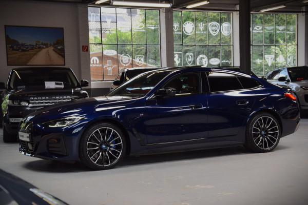 BMW i4 M50 High Executive 84 kWh Navi|Schuif/kantel-dak|ACC|SOH 92.21%|Leder|BTW|544pk!