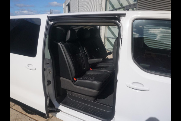 Opel Vivaro-e Dubbele Cabine 75kWh | STX Sport | Mooiste  bus van NL (!) | Lederen bekleding | Spoilerpakket | 18 inch Lichtmetalen velgen | Dynamic Comfort NAV Pakket | Winterpakket | 2x schuifdeur | Betimmering | Comfortstoelen |