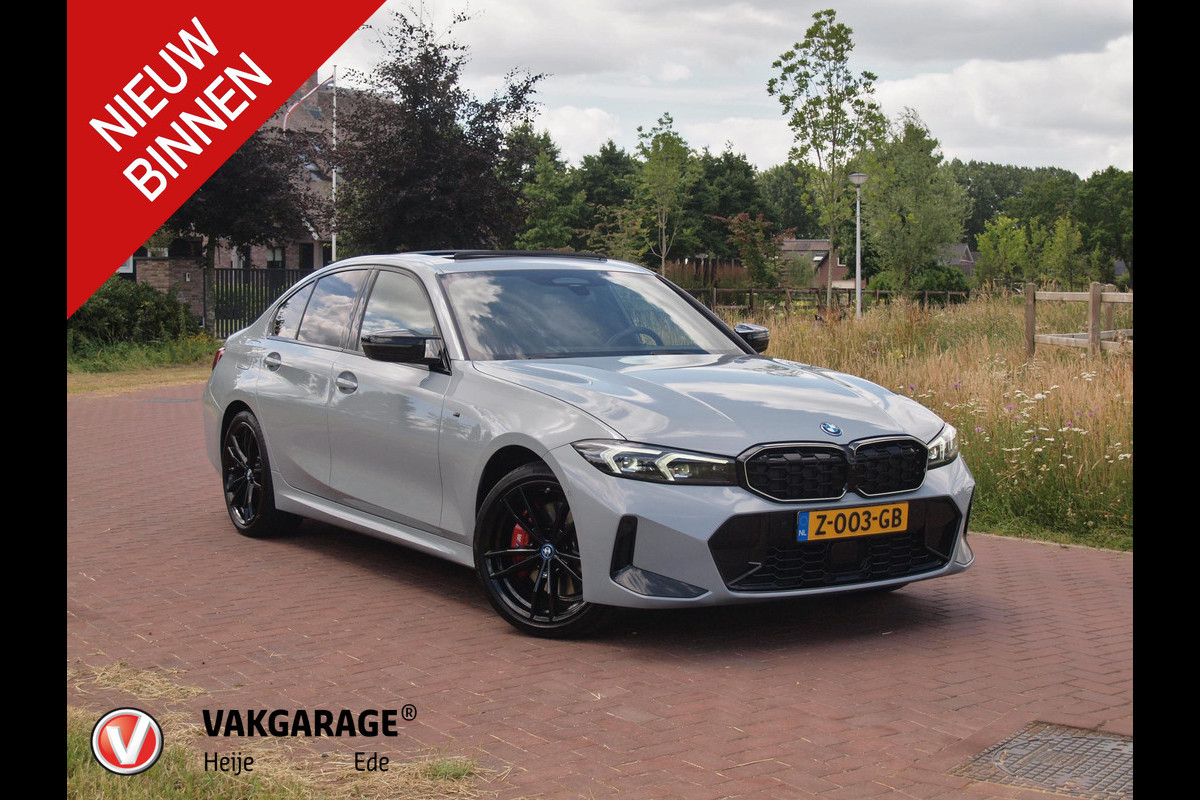 BMW 3-serie 330e | Iconic Glow Nieren | M-Pakket | Panoramadak | Trekhaak | 360 Camera | Sfeerverlichting | Harman Kardon |