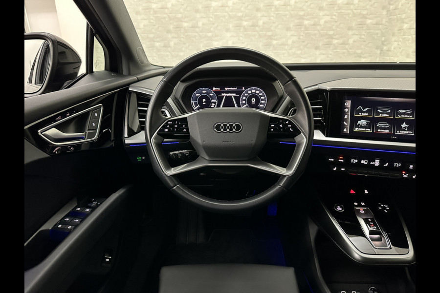 Audi Q4 e-tron 40 77 kWh S-Line #RS-Leder | Black-Edition | ACC | Sfeerverlichting | Virtual-Cockpit | Stoelverwarming | 3-Zone Clima | Virtual-Cockpit | Camera | LED | Getint Glas | Carplay | Autom. Parkeren |