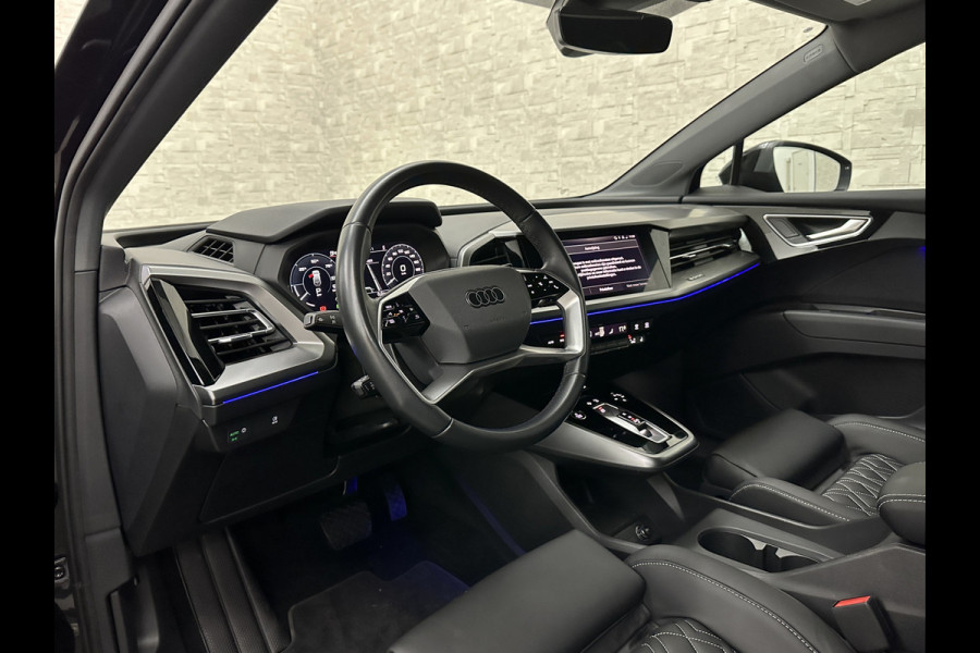 Audi Q4 e-tron 40 77 kWh S-Line #RS-Leder | Black-Edition | ACC | Sfeerverlichting | Virtual-Cockpit | Stoelverwarming | 3-Zone Clima | Virtual-Cockpit | Camera | LED | Getint Glas | Carplay | Autom. Parkeren |