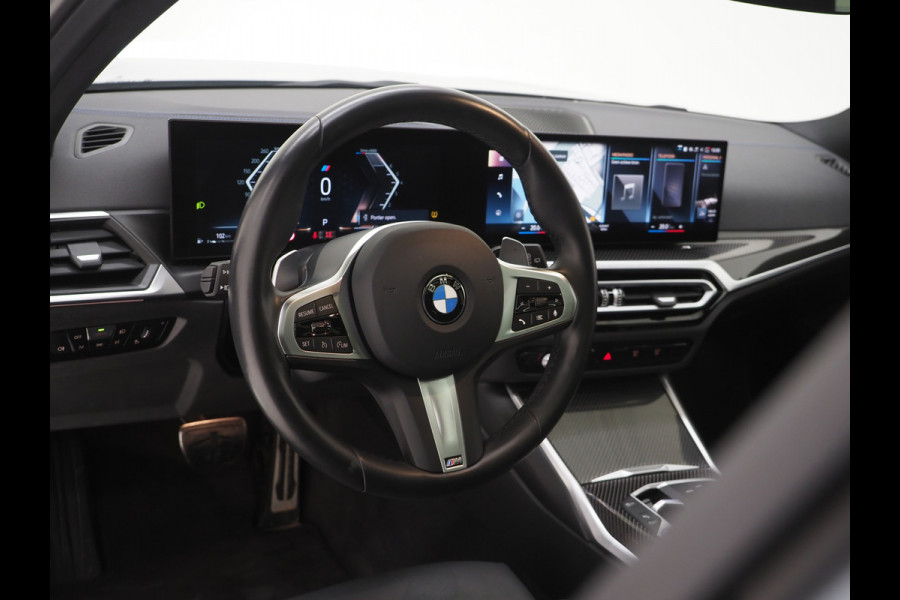 BMW 3 Serie Touring 320i M Sport Pro Brooklyn Grey | M Pro Stoelen | Panoramadak | Harman/Kardon | Carbon | Camera | Memory | Sfeerlicht