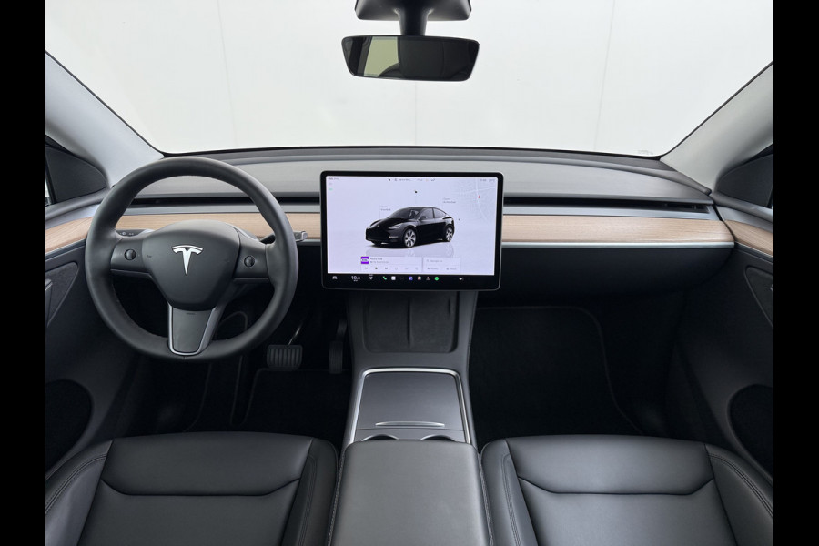 Tesla Model Y Long Range AWD 75kWh Warmtepomp Stoel+Stuur+Achterbankverwarming Premium Audio Leder Adap.Cruise Navi Camera's Ecc Keyless Voorv Elek.Achterklep AMD Ryzen™ Google Maps Dog+Kampeer modus Lmv 19" Led Privacy Glas Fabrieksgarantie op Accu en Motor tot 13-4-2031/192.000KM