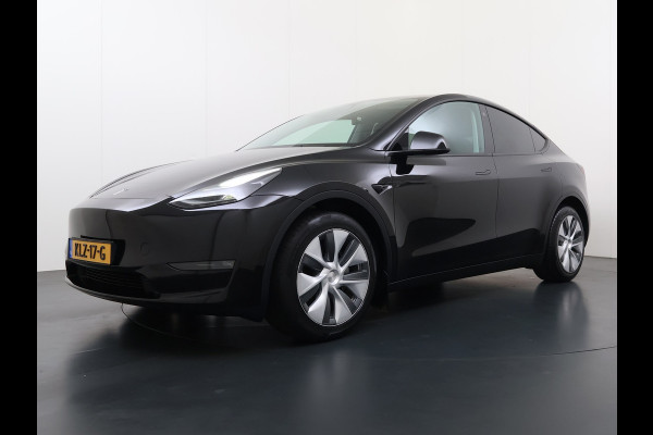 Tesla Model Y Long Range AWD 75kWh Warmtepomp Stoel+Stuur+Achterbankverwarming Premium Audio Leder Adap.Cruise Navi Camera's Ecc Keyless Voorv Elek.Achterklep AMD Ryzen™ Google Maps Dog+Kampeer modus Lmv 19" Led Privacy Glas Fabrieksgarantie op Accu en Motor tot 13-4-2031/192.000KM