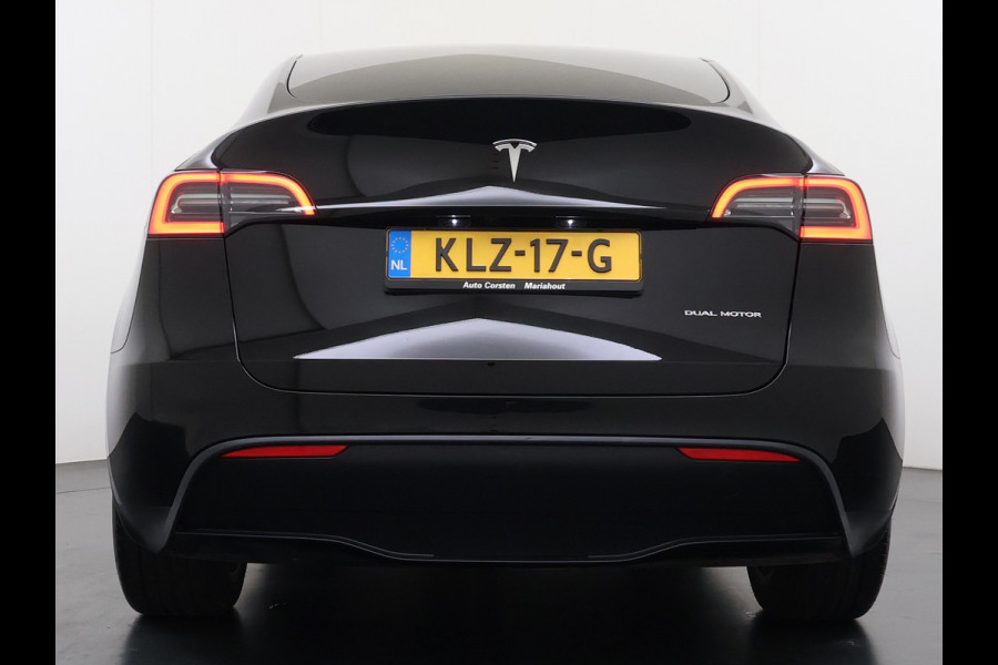 Tesla Model Y Long Range AWD 75kWh Warmtepomp Stoel+Stuur+Achterbankverwarming Premium Audio Leder Adap.Cruise Navi Camera's Ecc Keyless Voorv Elek.Achterklep AMD Ryzen™ Google Maps Dog+Kampeer modus Lmv 19" Led Privacy Glas Fabrieksgarantie op Accu en Motor tot 13-4-2031/192.000KM