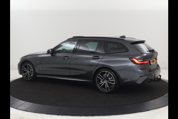 BMW 3 Serie Touring 320e Business Edition Plus M-sport | 84,4% SOH | Panoramadak | Leder | Elektrische trekhaak | Camera | Park assist | Cruise control | Carplay | Sfeerverlichting |