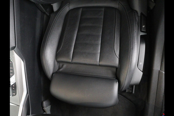 BMW 3 Serie Touring 320e Business Edition Plus M-sport | 84,4% SOH | Panoramadak | Leder | Elektrische trekhaak | Camera | Park assist | Cruise control | Carplay | Sfeerverlichting |