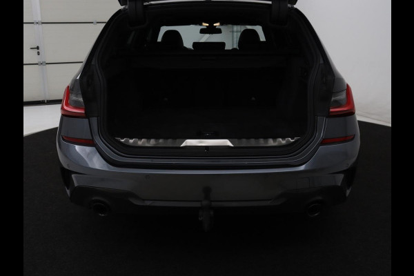 BMW 3 Serie Touring 320e Business Edition Plus M-sport | 84,4% SOH | Panoramadak | Leder | Elektrische trekhaak | Camera | Park assist | Cruise control | Carplay | Sfeerverlichting |