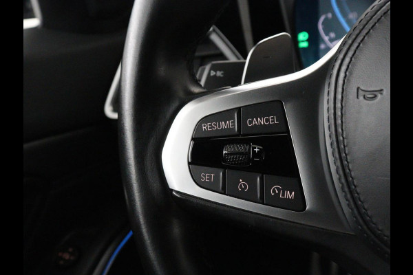 BMW 3 Serie Touring 320e Business Edition Plus M-sport | 84,4% SOH | Panoramadak | Leder | Elektrische trekhaak | Camera | Park assist | Cruise control | Carplay | Sfeerverlichting |