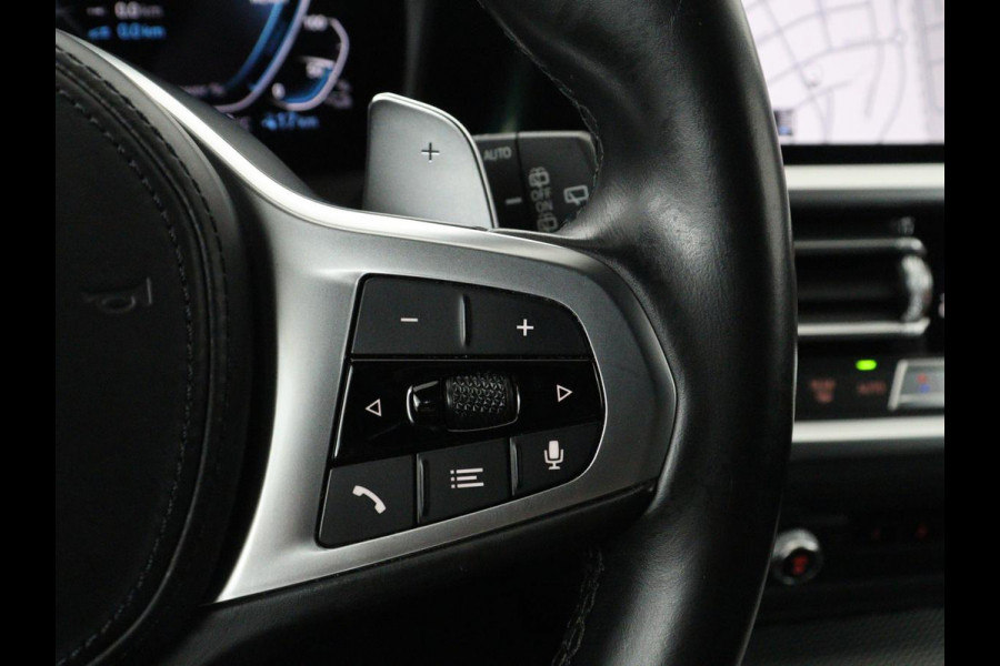 BMW 3 Serie Touring 320e Business Edition Plus M-sport | 84,4% SOH | Panoramadak | Leder | Elektrische trekhaak | Camera | Park assist | Cruise control | Carplay | Sfeerverlichting |