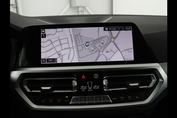 BMW 3 Serie Touring 320e Business Edition Plus M-sport | 84,4% SOH | Panoramadak | Leder | Elektrische trekhaak | Camera | Park assist | Cruise control | Carplay | Sfeerverlichting |