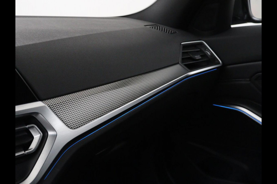 BMW 3 Serie Touring 320e Business Edition Plus M-sport | 84,4% SOH | Panoramadak | Leder | Elektrische trekhaak | Camera | Park assist | Cruise control | Carplay | Sfeerverlichting |