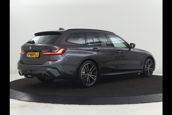 BMW 3 Serie Touring 320e Business Edition Plus M-sport | 84,4% SOH | Panoramadak | Leder | Elektrische trekhaak | Camera | Park assist | Cruise control | Carplay | Sfeerverlichting |