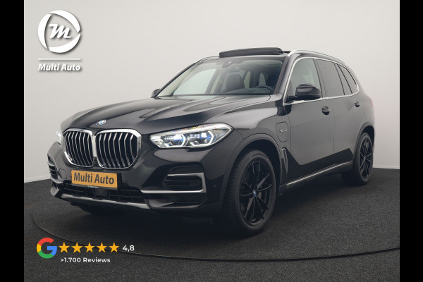 BMW X5 xDrive45e X Line PHEV 395pk Dealer O.H. | Trekhaak Af Fabriek | Panodak | Luchtvering | Head Up | Camera | Lederen Sportstoelen Memory & Verwarmd | Adaptief Onderstel | Sfeerverlichting | Keyless | Blis | Hifi | Plug In Hybrid |