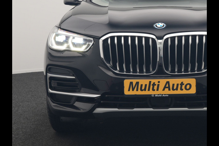 BMW X5 xDrive45e X Line PHEV 395pk Dealer O.H. | Trekhaak Af Fabriek | Panodak | Luchtvering | Head Up | Camera | Lederen Sportstoelen Memory & Verwarmd | Adaptief Onderstel | Sfeerverlichting | Keyless | Blis | Hifi | Plug In Hybrid |