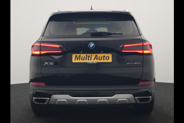 BMW X5 xDrive45e X Line PHEV 395pk Dealer O.H. | Trekhaak Af Fabriek | Panodak | Luchtvering | Head Up | Camera | Lederen Sportstoelen Memory & Verwarmd | Adaptief Onderstel | Sfeerverlichting | Keyless | Blis | Hifi | Plug In Hybrid |