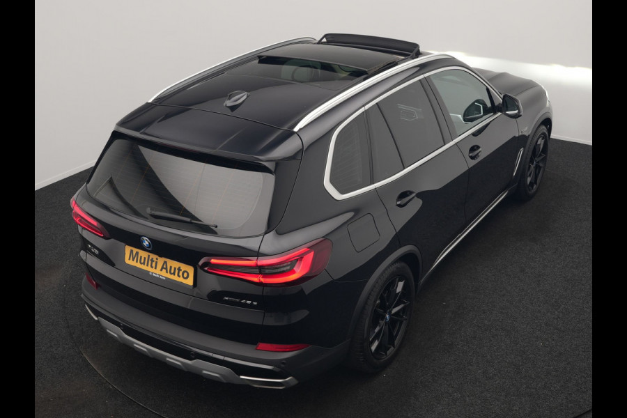 BMW X5 xDrive45e X Line PHEV 395pk Dealer O.H. | Trekhaak Af Fabriek | Panodak | Luchtvering | Head Up | Camera | Lederen Sportstoelen Memory & Verwarmd | Adaptief Onderstel | Sfeerverlichting | Keyless | Blis | Hifi | Plug In Hybrid |