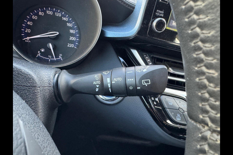 Toyota C-HR 1.8 Hybrid First Edition | Trekhaak, JBL, Apple CarPlay/Android auto, Dodehoekherkenning, Parkeersensoren, Stoelverwarming, LED