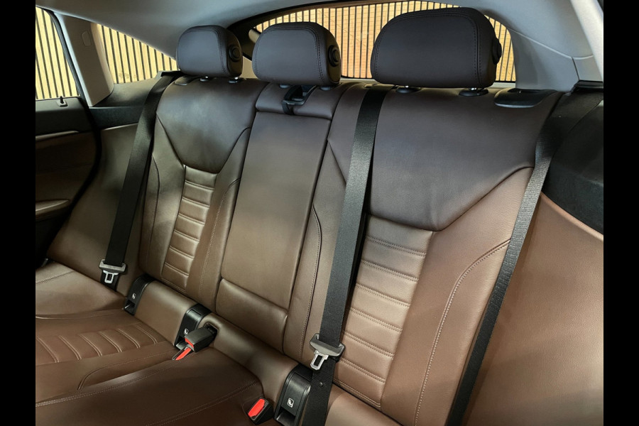 BMW i4 EDrive40 High Executive 84 kWh|99% SOH|PANORAMADAK|HEAD-UP|ACC|MEMORY|VOLLEDER|CARPLAY|CAMERA|STOELVERW|NAP|ORG.NL|INCL.BTW