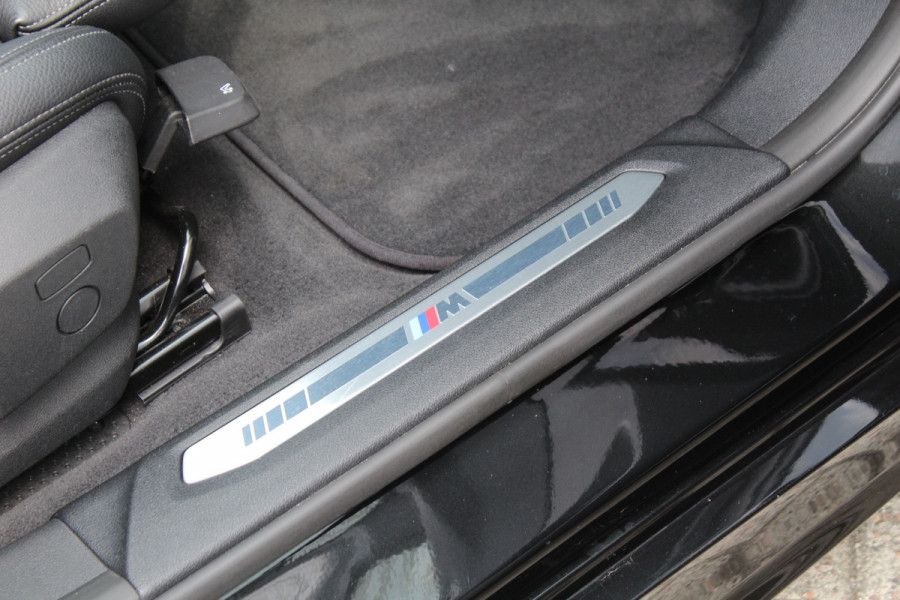 BMW 1-serie 118i High Executive M-Sport Plus | Shadow Line | Panoramadak | Leder | Active Cruise