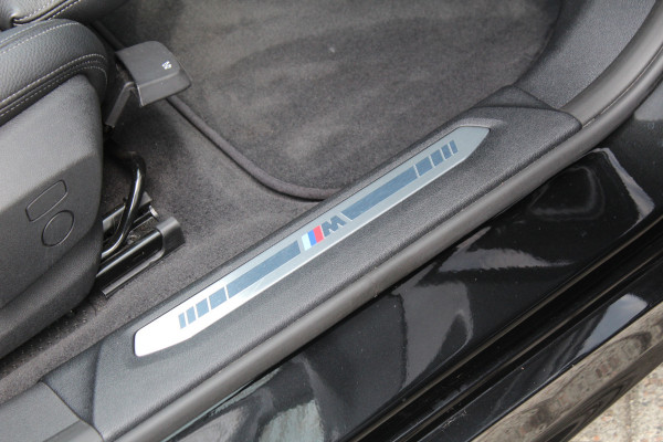 BMW 1-serie 118i High Executive M-Sport Plus | Shadow Line | Panoramadak | Leder | Active Cruise