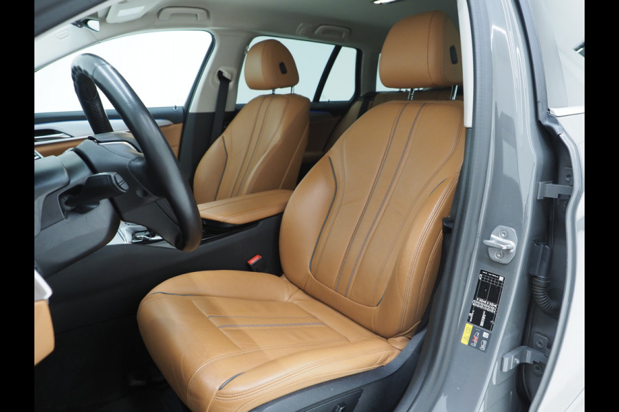BMW 5 Serie Touring 520e | Leder | HUD | Adaptive Cruise | 360 | Dodehoek | Sfeerlicht | Stoelverwarming