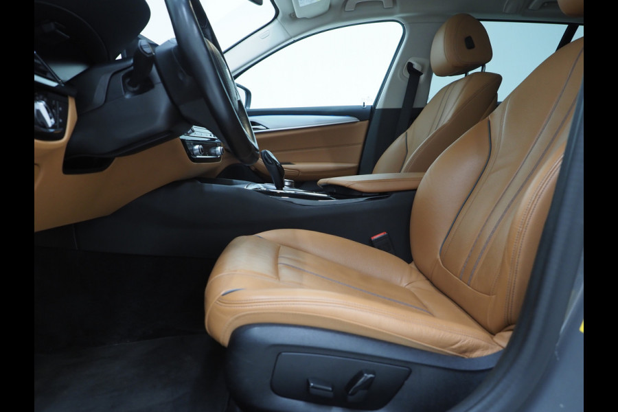 BMW 5 Serie Touring 520e | Leder | HUD | Adaptive Cruise | 360 | Dodehoek | Sfeerlicht | Stoelverwarming
