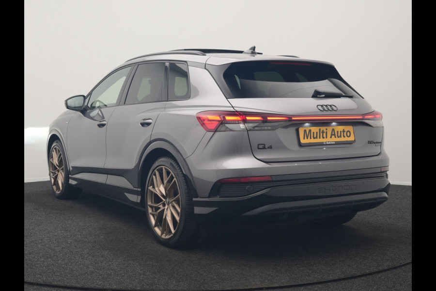Audi Q4 e-tron 50 Quattro Edition One 2x S Line 77 kWh 300pk Dealer O.H. | Panodak | Head Up | Adaptive Cruise | Matrix LED | Camera | Lederen Sportstoelen Memory & Verwarmd | Keyless | Apple Carplay | Blis | DAB | 21"L.M |