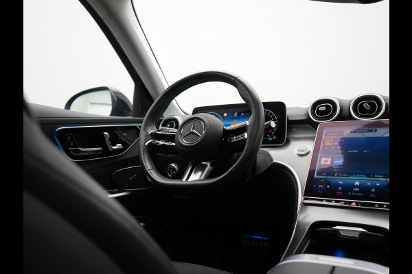 Mercedes-Benz C-Klasse Estate 300 e 4MATIC AMG Line PHEV 313pk Dealer O.H. | Trekhaak Af Fabriek | Panodak | 360 Camera | Head Up | Adaptive Cruise | Digital Light | Alcantara Sportstoelen Memory & Verwarmd | Sfeerverlichting | Apple Carplay | Blis | DAB | Plug In Hybrid |
