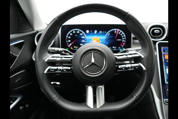 Mercedes-Benz C-Klasse Estate 300 e 4MATIC AMG Line PHEV 313pk Dealer O.H. | Trekhaak Af Fabriek | Panodak | 360 Camera | Head Up | Adaptive Cruise | Digital Light | Alcantara Sportstoelen Memory & Verwarmd | Sfeerverlichting | Apple Carplay | Blis | DAB | Plug In Hybrid |