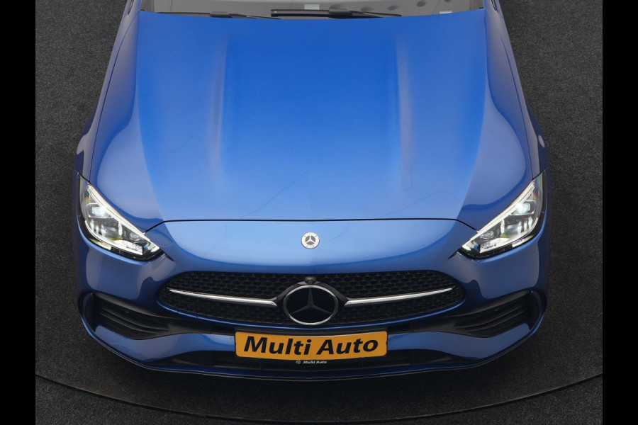 Mercedes-Benz C-Klasse Estate 300 e 4MATIC AMG Line PHEV 313pk Dealer O.H. | Trekhaak Af Fabriek | Panodak | 360 Camera | Head Up | Adaptive Cruise | Digital Light | Alcantara Sportstoelen Memory & Verwarmd | Sfeerverlichting | Apple Carplay | Blis | DAB | Plug In Hybrid |