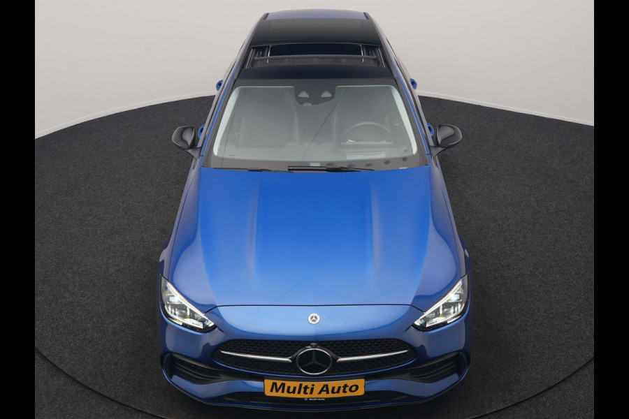 Mercedes-Benz C-Klasse Estate 300 e 4MATIC AMG Line PHEV 313pk Dealer O.H. | Trekhaak Af Fabriek | Panodak | 360 Camera | Head Up | Adaptive Cruise | Digital Light | Alcantara Sportstoelen Memory & Verwarmd | Sfeerverlichting | Apple Carplay | Blis | DAB | Plug In Hybrid |